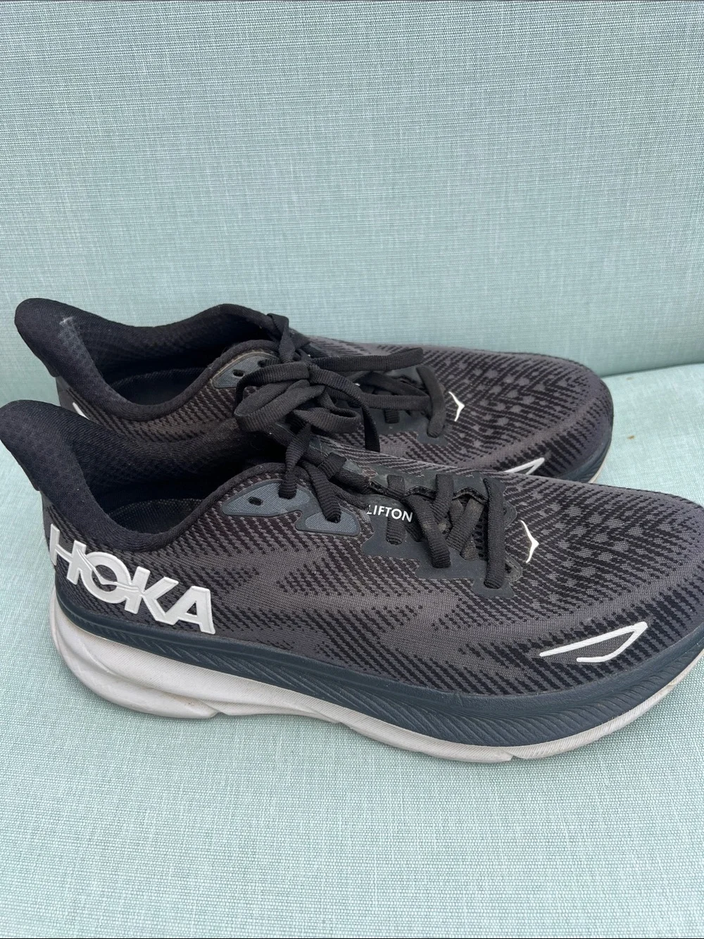 Hoka Black and White Clifton 9 Cushioned Running Shoes